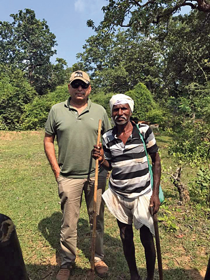 Sunil Mehta with Gheenaji, a resident of Alizanza village, who inspite of having survived a tiger attack, has dedicated his life to protecting the tiger's forest. Interestingly, the villagers of Alizanza have now christened this male tiger âGheenaji'. Sunil Mehta with Gheenaji, a resident of Alizanza village, who inspite of having survived a tiger attack, has dedicated his life to protecting the tiger's forest. Interestingly, the villagers of Alizanza have now christened this male tiger âGheenaji'.