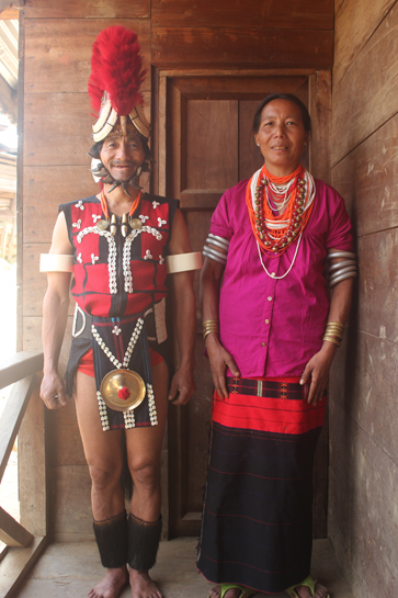 Alemba smiles in his traditional Naga finery. Alemba smiles in his traditional Naga finery.