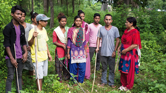 Maya Yogi Tharu engages with community members at Khata, to involve them in conservation interventions.