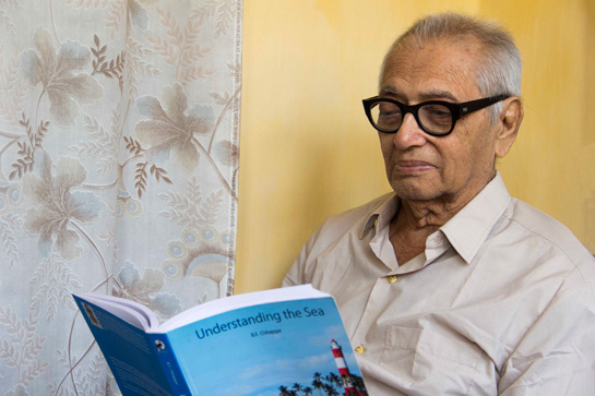 Dr. Chhapgar with his book, Understanding the Sea.