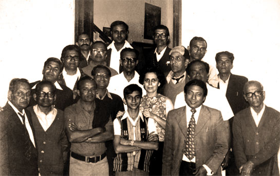 This photograph of the first Field Directors of the original nine tiger reserves - (front row, from left) J. P.  Sinha (Palamau), S. R. Choudhury (Similipal), H. S. Panwar (Kanha), Swaraj Roy, two visitors; (second row, second from left) Dr. Kalyan Chakravarty, Deputy Director (Sundarbans), Diana Roy, a visitor; (third row) Kafeel Sheikh (with spectacles), Deputy Director (Melghat), B. R. Koppikar (Melghat, later Director, Project Tiger after Kailash Sankhala), Sunil Roy (at whose residence they met over tea, C. B. Singh with cap - Corbett), a visitor; (fourth row, left) Savarkar (with moustache; then Research Officer, Melghat); (on right) S. Deb Roy (Manas); (at rear), two other visitors - this photograph was taken by the author in Kolkata in 1976.