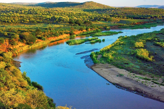 A bird's eye view of a river at Umfolozi Park, South Africa. Habitats such as these, says Harvey Locke, are being unraveled through habitat destruction, over-hunting, consumption and over-fishing.