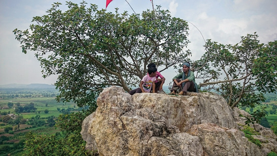 My guides Aniket and Narendra try to convince me about the pile of gold we're sitting on.