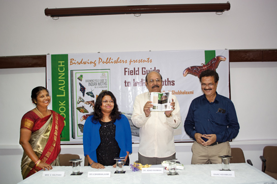 Dr. Asad Rahmani (second from right), former director of the Bombay Natural History Society, releases Dr. Vaylure's book Field Guide to Indian Moths on May 1, 2018, in Mumbai.