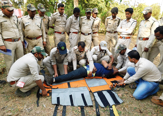 Trainees learn to extricate a trauma victim using the log-roll technique that protects the spine while moving the victim to a stretcher. These trainings also emphasise the importance of teamwork and communication while handling trauma victims.