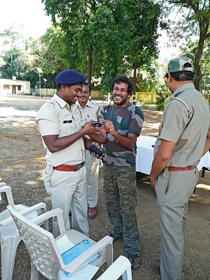The ever-smiling Hans distributes point-and-shoot cameras to an elated Forest Department staff at the Tadoba-Andhari Tiger Reserve The ever-smiling Hans distributes point-and-shoot cameras to an elated Forest Department staff at the Tadoba-Andhari Tiger Reserve