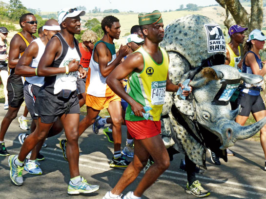 Conservation supporters participate in an anti-poaching awareness run in Kenya.