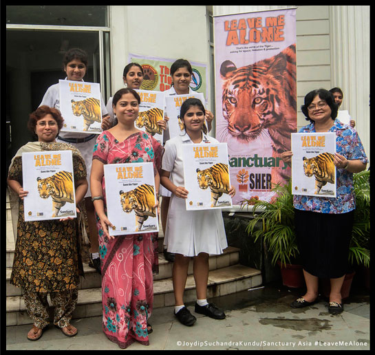 Students from La Martiniere for Girls participate in a Global Tiger Day action.