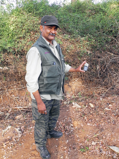 Nagaraj Bhat and his trusty GPS on the anti-snare walk at Kalala Range, Nagarahole. Nagaraj Bhat and his trusty GPS on the anti-snare walk at Kalala Range, Nagarahole.