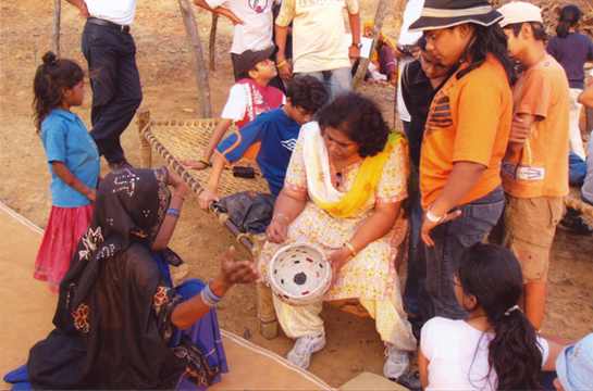 GREEN TEACHER AWARD: Madhu Bhatnagar is mentor and &acirc;Earth Mother' to an army of young children. She helped form and shape the Junior Tiger Task Force whose members want tribal communities to be honoured and protected, but not by sacrificing the tiger.