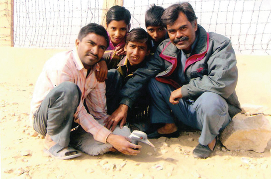 Sevaram (extreme left) rescues a Demoiselle Crane 