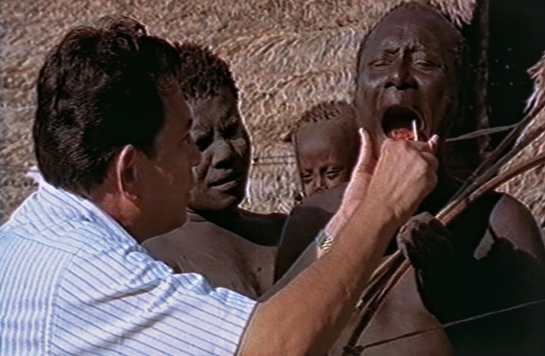 A buccal swab is collected from an Onge tribal for genetic studies.