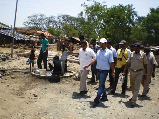 Praveen Pardeshi and Forest Department officials visit a relocated village in Melghat.