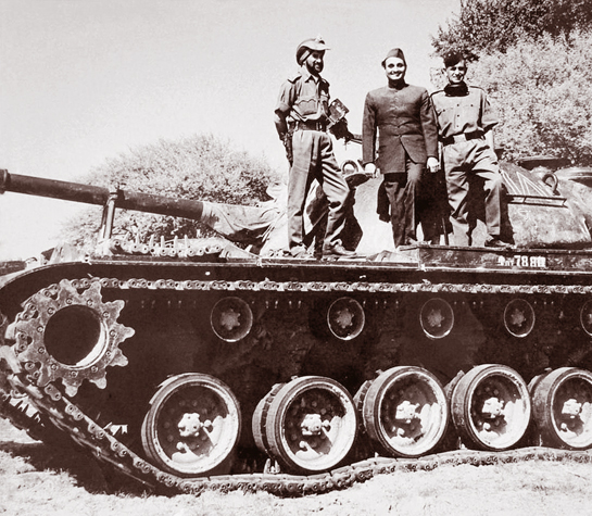 Dr. Karan Singh atop a captured Pakistani tank with Major General Rajinder Singh Sparrow (left) during the 1965 war. Dr. Singh fears that we do not understand the sacrifices made to free our country and build it and that we could destroy all the things that symbolise India - our holy rivers, our productive soils, our sparkling seas, our lofty mountains and, of course, our verdant forests, represented by the tiger.