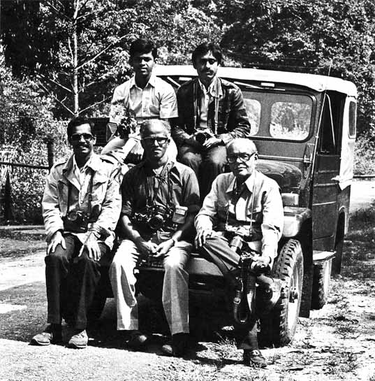 Seen at Topslip, Anamalai (top row left to right): T. A. Jayakumar and K. Jayaram; (bottom row left to right): K. Maruthachalam, T. N. A. Perumal, H. H. of Korea. Perumal attributes his knowledge of animal behaviour to years of wildlife watching and from meeting people who shared their own knowledge and deep experiences. Seen at Topslip, Anamalai (top row left to right): T. A. Jayakumar and K. Jayaram; (bottom row left to right): K. Maruthachalam, T. N. A. Perumal, H. H. of Korea. Perumal attributes his knowledge of animal behaviour to years of wildlife watching and from meeting people who shared their own knowledge and deep experiences.