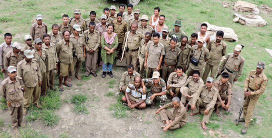 After a hard day's work: Sonali Ghosh with her rhino monitoring teams at Kuribeel camp, Manas.