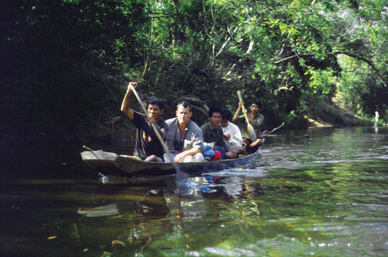 Dr. Rabinowitz on a boat in the wilds of Thailand, where he tracked leopards, tigers and other big cats. His field research on the Indochinese tiger resulted in the declaration of the country's first World Heritage Site.