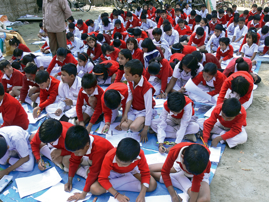 Students from Dadara village take part in an art competition as part of the awareness drive initiated by the author and her colleagues for the conservation of the Greater Adjutant.