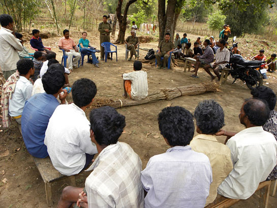 Villagers and forest officials discuss ways to meet their fuelwood requirements without harming the langurs of the Kakoijana Reserve Forest.