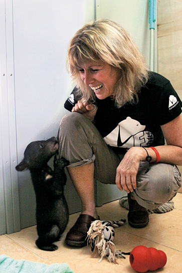 Dr. Jill Robinson with a rescued moon bear cub. Dr. Jill Robinson with a rescued moon bear cub.