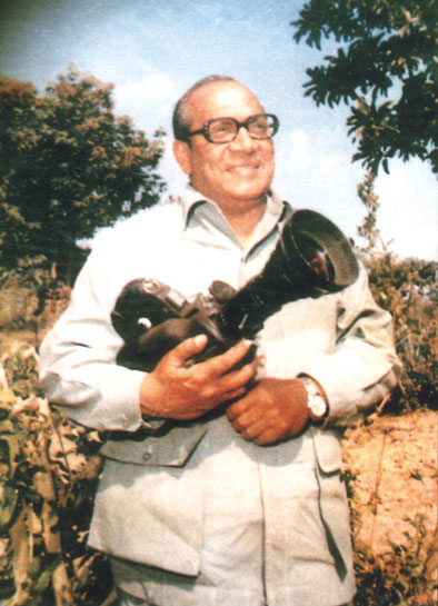 Dr. Robin Banerjee in his younger days with his most beloved possession, his camera. Dr. Robin Banerjee in his younger days with his most beloved possession, his camera.
