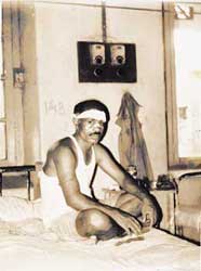 Dhruba Basantia and Niranjan Behera, two guards injured in a clash with poachers in Simlipal in May &acirc;98. Credit:Simlipal Tiger Reserve.