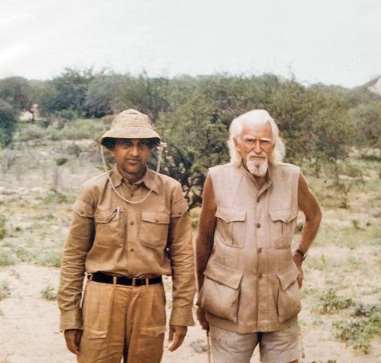 Prof. Brahmachary with legendary British wildlife conservationist George Adamson (right) at the Kora Lion Camp in Kenya.