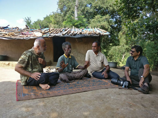 Chandru in conversation with forest department members
