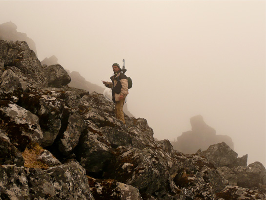 Shashank Dalvi searching for thrushes, Sela pass, Arunachal Pradesh June 2009