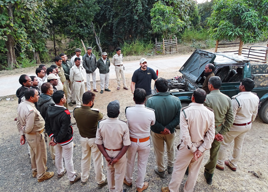 Kiran Rahalkar, the lead trainer in WCT's Wildlife Law Enforcement Training (WLET) team instructs forest guards on vehicle-search methodologies during a field session on site security at the Pench Tiger Reserve, Madhya Pradesh.