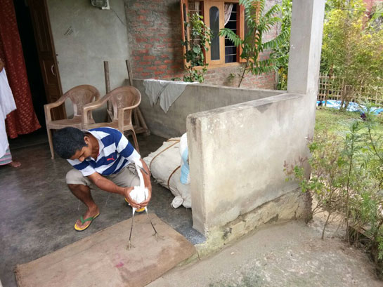 Manoj Gogoi treating an Egret
